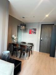 Modern dining area with table and chairs