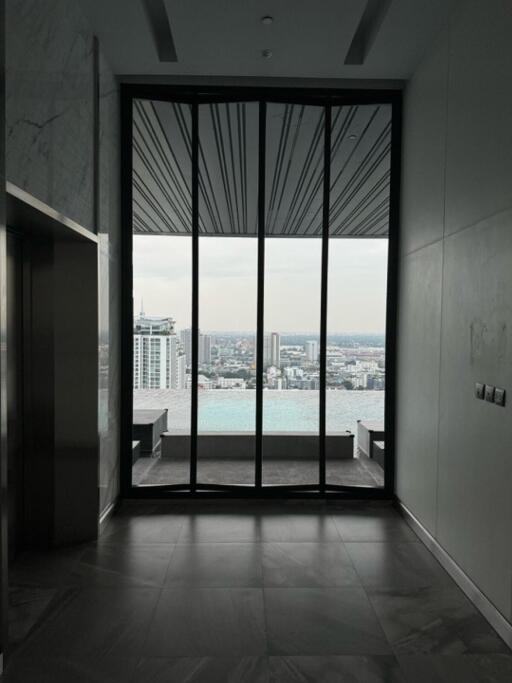 Panoramic city view with floor-to-ceiling window
