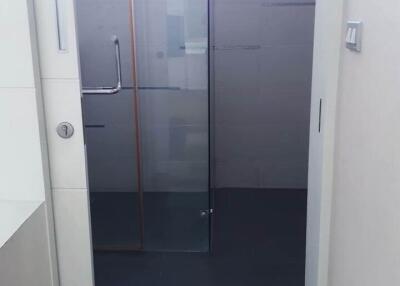 Modern bathroom with glass shower door