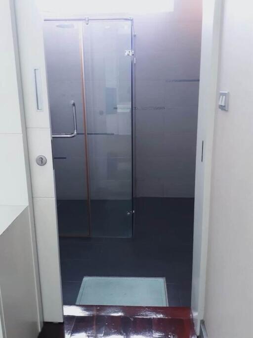 Modern bathroom with glass shower door