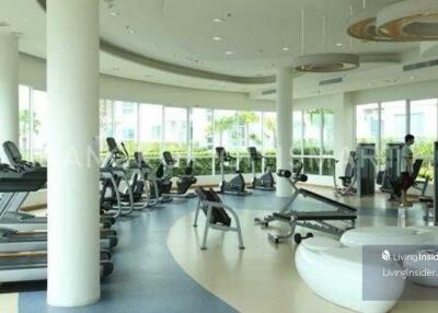 Modern gym with various exercise equipment