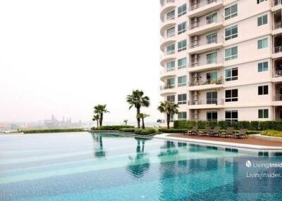 High-rise apartment building with swimming pool