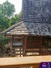 Wooden house exterior with trees