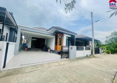 Front view of a modern residential house with driveway