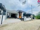 Front view of a modern residential house with driveway