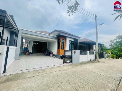 Front view of a modern residential house with driveway