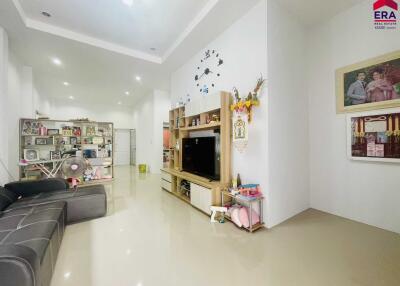 Modern living room with entertainment unit and decorations