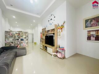 Modern living room with entertainment unit and decorations