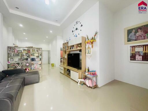 Modern living room with entertainment unit and decorations