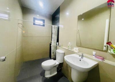 Modern bathroom with sanitary fittings and mirror