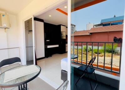 Balcony with a view of the living space and outdoor area