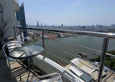 Balcony with a view of the city and river