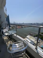 Balcony with a view of the city and river