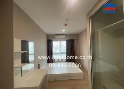 Modern bedroom with vanity table and large window