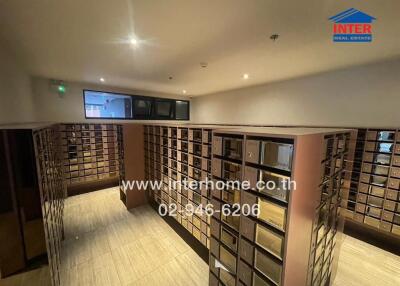 Mailroom with multiple mailboxes in a residential building