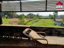 Balcony with scenic rural view and lounge chairs