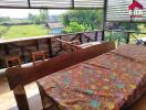 balcony dining area with countryside view