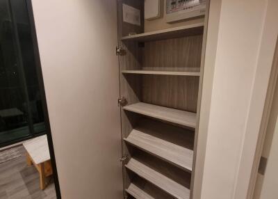 Built-in storage cabinet with multiple shelves