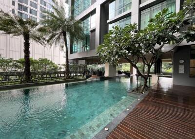 Outdoor swimming pool in a modern residential complex
