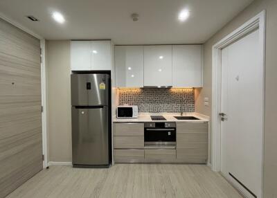 Modern kitchen with appliances and cabinetry