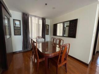 Dining room with wooden table and chairs