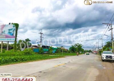 Street view with cloudy sky