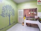 Small kitchen with green walls and minimalist decor