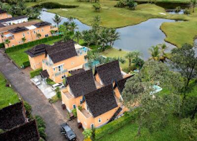 Aerial view of residential buildings near a lake