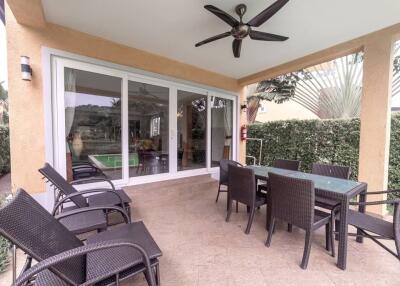 Outdoor patio with dining table and chairs