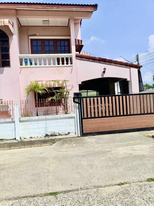 Two-story house with a front gate