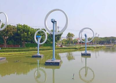 Outdoor view with art installations over water