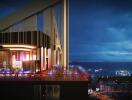 High-rise building with city and ocean view at night