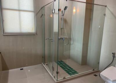 Modern bathroom with glass shower enclosure