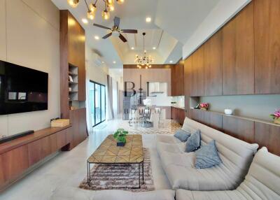 Modern living room with kitchen view