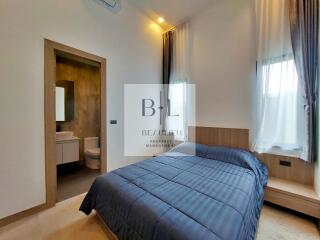 Modern bedroom with a double bed and en-suite bathroom