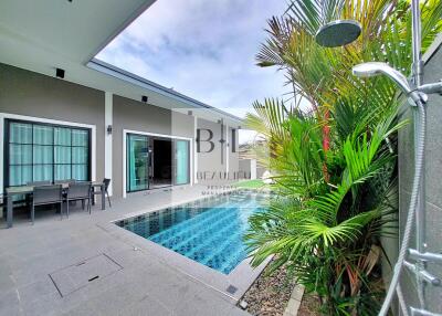 Modern patio area with swimming pool