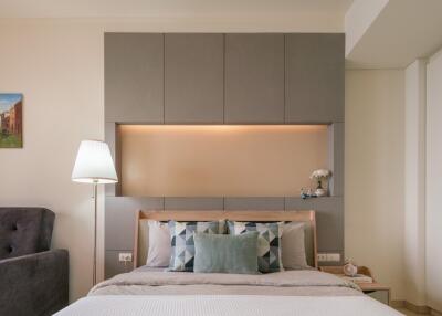 Modern and cozy bedroom with accent lighting