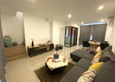 Modern living room with furniture and dining area