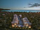 Aerial view of a modern housing community near the coast at dusk