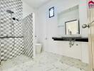 Modern bathroom with shower and tiled walls