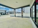 Covered front area with view of neighboring houses