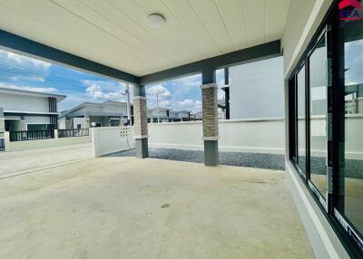 Open porch with a view of modern houses