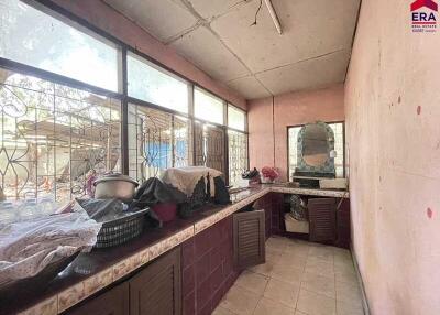 Spacious kitchen with large windows