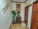 Decorated hallway with flooring and decorative items