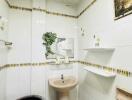 Small bathroom with plant decor and ceramic sink