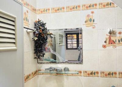 Small bathroom with sink and mirror