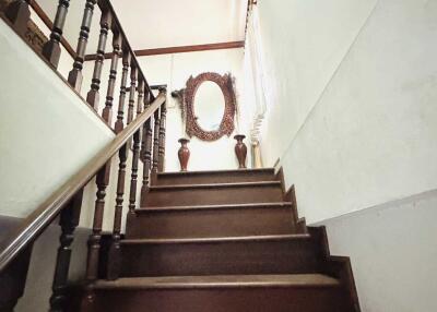 Wooden staircase with decorative elements.