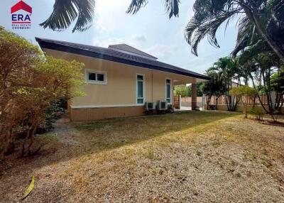 Exterior view of a house with a garden area