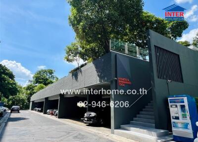 Residential building with parking area and fitness swimming pool sign