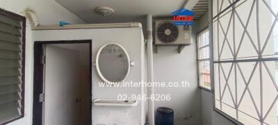 Utility area with HVAC unit